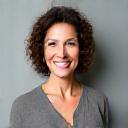 Portrait of Sarah J., a Vital Hearth client who achieved significant gut health improvements.